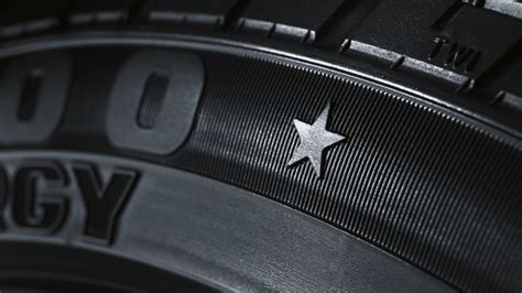 BMW star-spoke tire with a star symbol