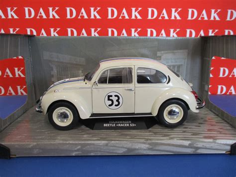 Modellino Maggiolino Volkswagen nero con striscia dorata