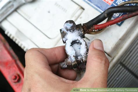 Image showing battery terminals with corrosion and clean terminals