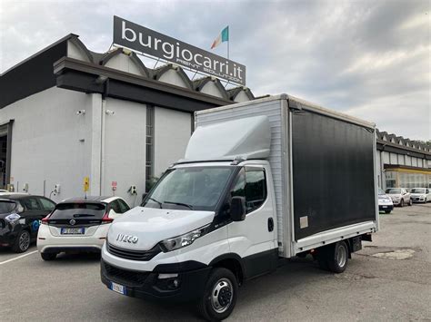 Furgone centinato con sponde apribili