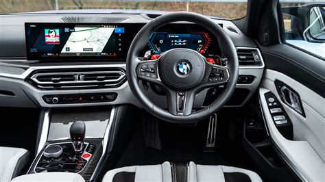 BMW M3 Touring interior with curved display