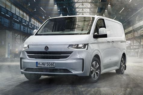 Volkswagen Transporter van front view with bright LED headlights