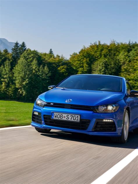Curva stradale con Scirocco in azione