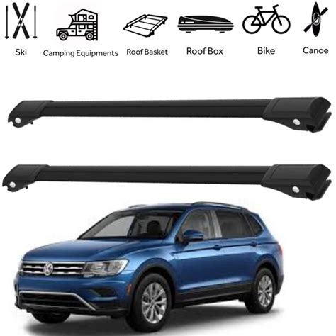 Volkswagen Tiguan con box da tetto carico