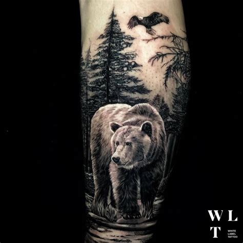 Tatuaggio di un orso in bicicletta
