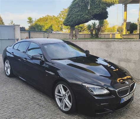 BMW 640d Gran Coupé in movimento su strada panoramica