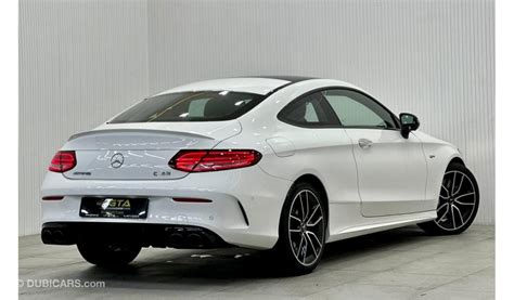 Dettaglio della mascherina Matrix e badge AMG sulla C 43 Coupé