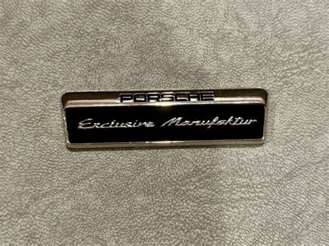Porsche Exclusive Manufaktur logo and custom interior