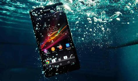 Smartphone con bolle d'acqua uscendo dagli altoparlanti
