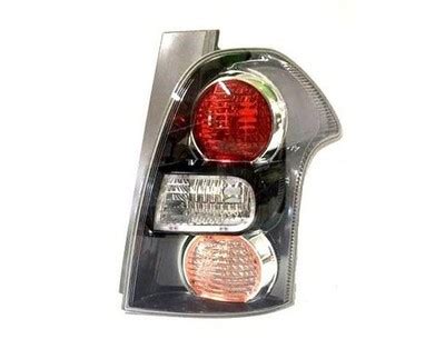 Toyota Corolla E120 faro posteriore danneggiato