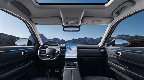 Vista laterale del JAECOO 7 Super Hybrid con cerchi in lega