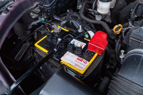 Car battery under the hood of a Toyota C-HR