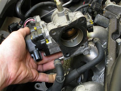 Posizione del corpo farfallato in un motore