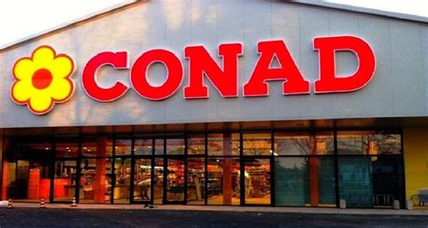 Logo Conad e Auchan affiancati