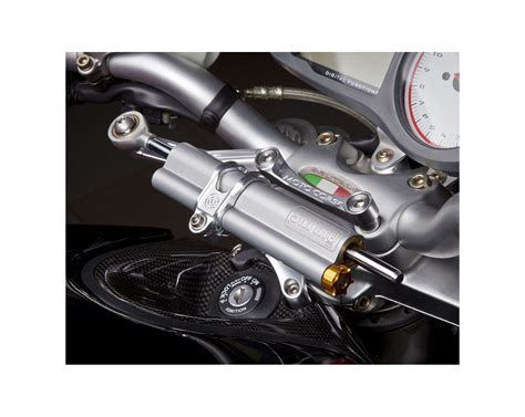 Ammortizzatore di sterzo Ohlins smontato con componenti interni